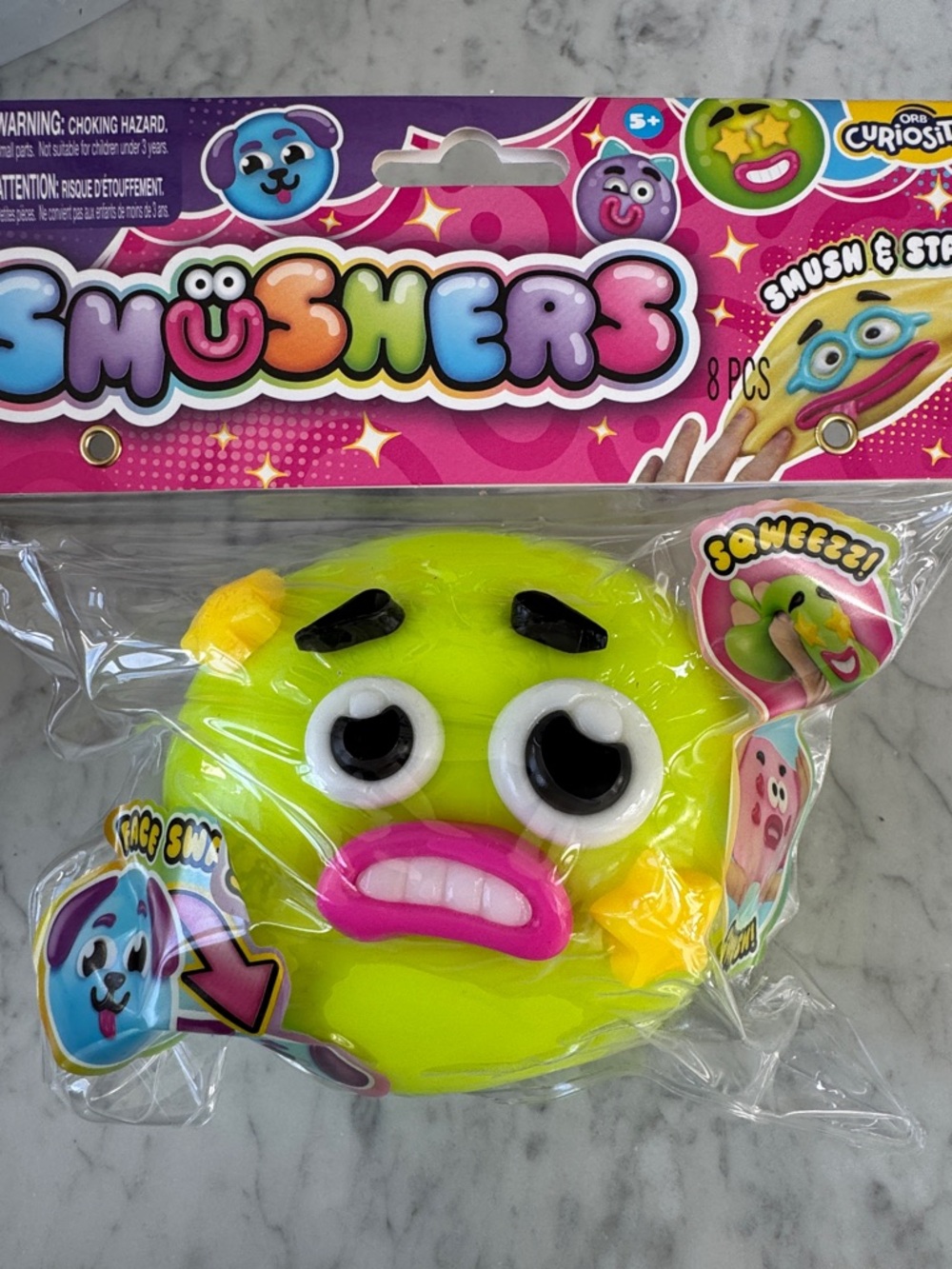 Usher Squishy Face Toy - Yellow & Pink